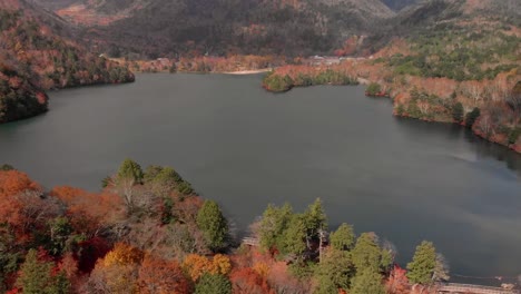 Aerial-view-of-lake-Yunoko-and-autumn-foliage,-Nikko,-Tochigi,-Japan