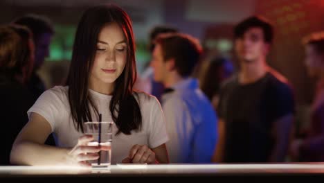 Boy-and-girl-checking-each-other-out-in-bar