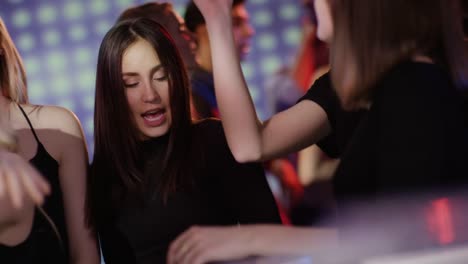 dark-haired-girl-dancing-at-club