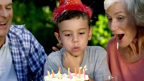 A-little-boy-blowing-out-the-candles