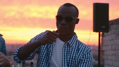 Cool-African-American-Guy-Dancing-at-Sunset-Party