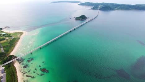 Aerial-shot-of-bridge-spanning-island