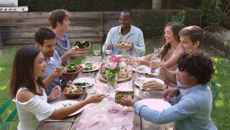 Friends-Eat-And-Drink-At-Outdoor-Party-Table-Shot-On-R3D