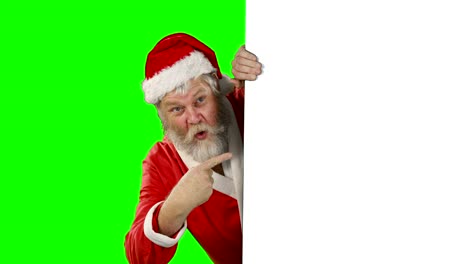 Surprised-santa-claus-waving-hand-on-green-screen