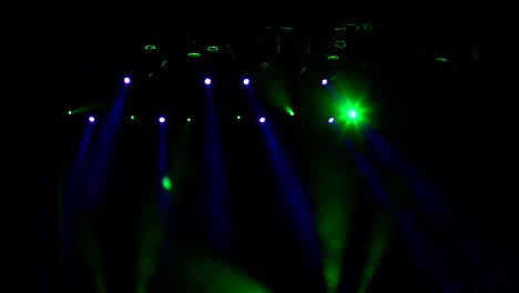 Blue-and-green-light-on-stage.