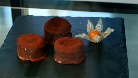 Chocolate-cakes-on-the-black-display-of-a-pastry-shop