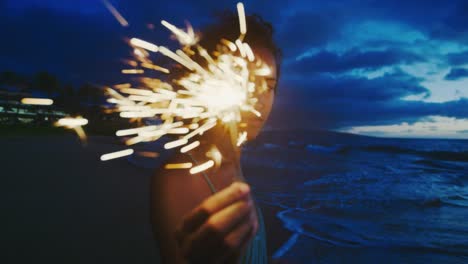 Woman-with-Sparkler-at-Sunset