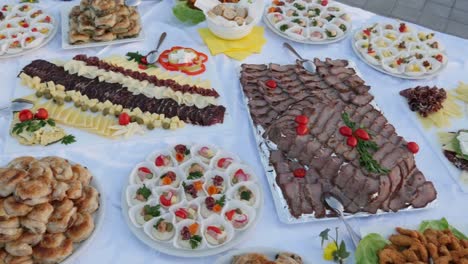 A-moving-footage-of-a-Swedish-table-waiting-for-the-guests-to-take-some-food-on-their-plates