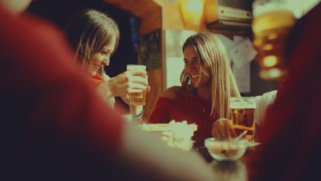 group-of-friends-at-the-pub.-shot-in-slow-motion