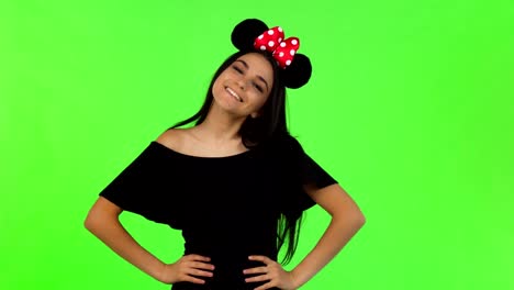 Beautiful-woman-wearing-fluffy-mouse-ears-posing-playfully