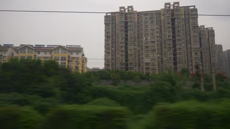Shangai-wuhan-día-lluvioso-tren-carro-paseo-ventana-pov-panorama-4k-china