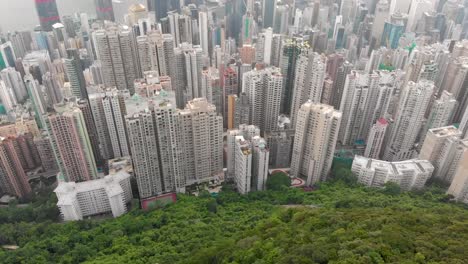 Aerial-tilt-up-shot-of-Hong-Kong-skyline