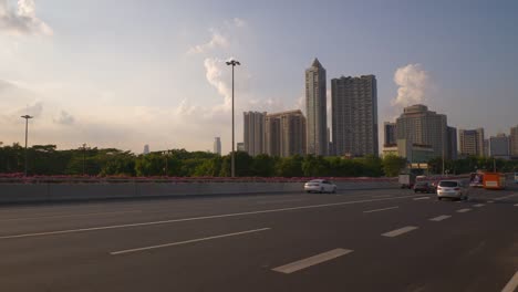 ciudad-de-Guangzhou-atardecer-tráfico-carretera-panorama-4k-china