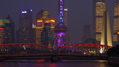 iluminación-nocturna-shanghai-ciudad-famoso-río-Centro-Bahía-puente-panorama-4k-china