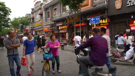 day-time-wuhan-city-famous-walking-street-bikers-panorama-4k-china