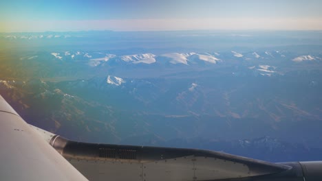 sunny-day-flying-airplane-wing-passenger-window-view-panorama-4k-china