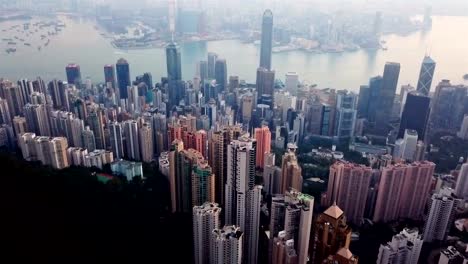 Aerial-view-of-Hong-Kong-Downtown.-Financial-district-and-business-centers-in-smart-city-in-Asia.-Top-view-of-skyscraper-and-high-rise-buildings.