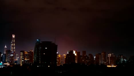 Nightime-view-from-the-Bund-over-Lujiazui-in-Pudong-distric-in-Shanghai,-China.