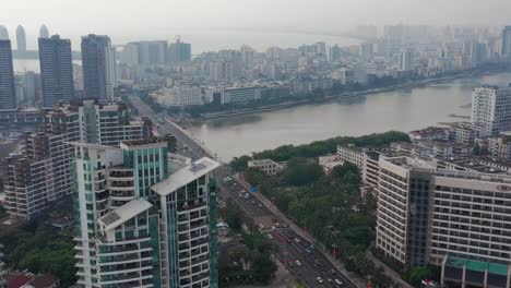 noche-tiempo-hainan-isla-sanya-tráfico-fluvial-puente-aéreo-arriba-abajo-panorama-4k-china