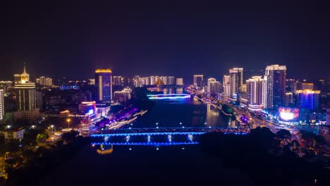 nachts-beleuchtet-Sanya-Stadt-Fluss-aerial-Panorama-Zeitraffer-4k-china