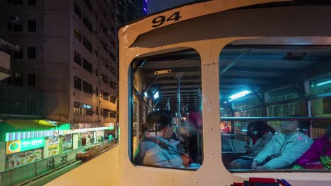 noche-ciudad-luz-tranvía-tráfico-por-carretera-viaje-de-lapso-de-tiempo-de-4-k-de-hong-kong