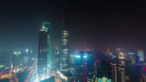 china-night-illumination-shanghai-cityscape-roof-top-aerial-panorama-4k-time-lapse