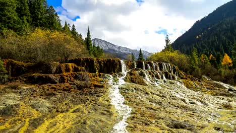 Huanglong-Mountain-With-Beautiful-Nature-Calcification-pool-In-Sichuan,-China,