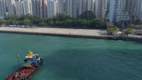 China-hong-kong-city-día-soleado-Bahía-victoria-puerto-barco-paseo-aéreo-panorama-4k