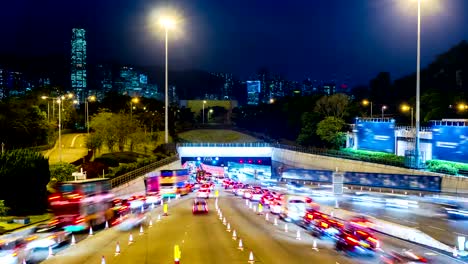 Busy-Traffic-Going-Into-Tunnel-at-Night.-4k-Tight-Still-Shot.