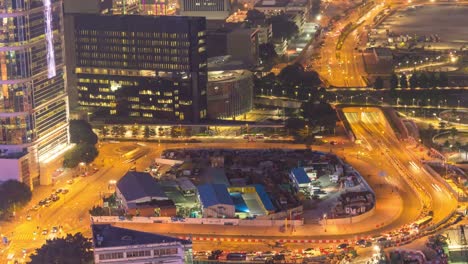 China-Nacht-Hong-Kong-Verkehr-Straße-Kreis-Dach-führenden-Bauunternehmen-Panorama-4k-Zeitraffer