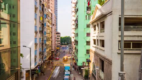 China-hong-kong-city-día-soleado-viven-panorama-de-azotea-calle-bloque-tráfico-4k-lapso-de-tiempo