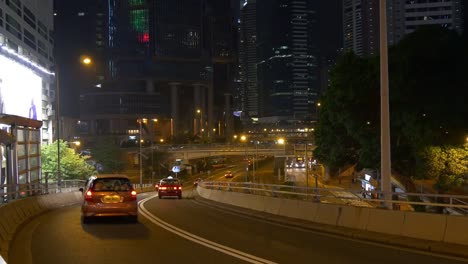 noche-iluminada-hong-kong-ciudad-centro-tráfico-cruce-calle-panorama-4k-china