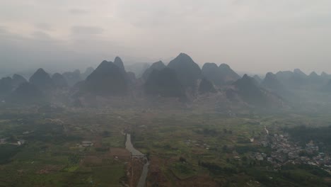 aerial-view-of-Li-River-and-Karst-mountains.-Located-near-The-Ancient-Town-of-Xingping,-Yangshuo-County,-Guilin-City,-Guangxi-Province,-China.