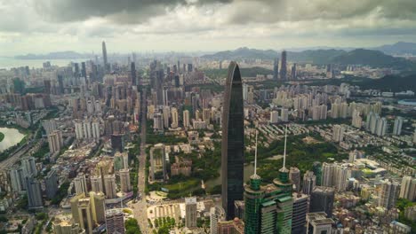 china-shenzhen-cityscape-sunny-day-KK100-building-aerial-panorama-4k-timelapse