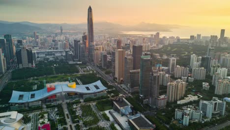 China-Shenzhen-Stadtbild-KK100-Gebäude-Sonnenuntergang-Himmel-Innenstadt-Rathaus-aerial-Panorama-4k-Zeitraffer