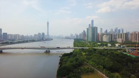 día-tiempo-guangzhou-ciudad-río-Perla-panorama-aéreo-4k-china