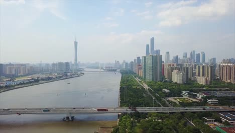 día-tiempo-guangzhou-ciudad-río-Perla-parte-centro-panorama-aéreo-4k-china