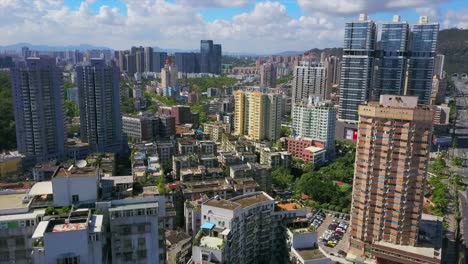 Zhuhai-paisaje-soleado-día-edificios-de-apartamentos-panorama-aéreo-4k-china
