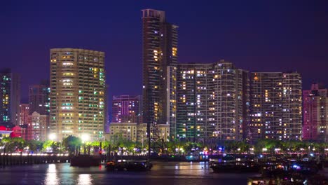 zhuhai-city-bay-night-illuminated-yacht-boat-dock-panorama-4k-time-lapse-china