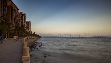 sunset-sky-zhuhai-cityscape-apartment-buildings-bay-panorama-4k-time-lapse-china