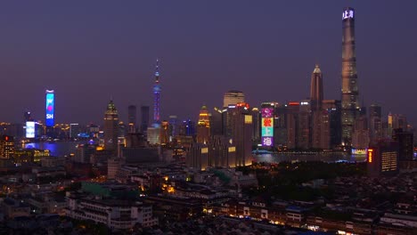 Sonnenuntergang-Nacht-beleuchtete-Stadt-Innenstadt-auf-dem-Dach-Panorama-4k-China-shanghai