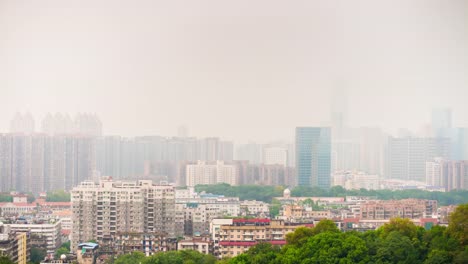 sunny-foggy-day-light-wuhan-cityscape-rooftop-panorama-4k-time-lapse-china