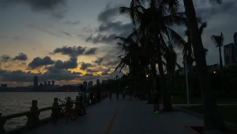 china-sunset-sky-zhuhai-cityscape-walking-bay-panorama-4k-timelapse