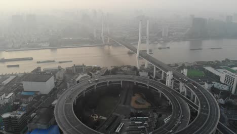 Nanpu-Bridge-over-Huangpu-River-in-Dawn,-Shanghai,-China