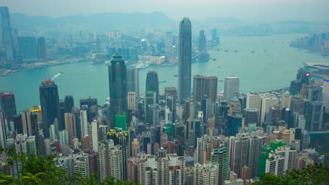 Tag-zu-Nacht-Zeitraffer-Video-von-Hong-Kong-City-Skyline-Blick-von-der-Spitze-Zeitraffer-4K