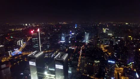 Toma-aérea-del-paisaje-urbano-de-Shanghai-y-el-horizonte-por-la-noche,-Shanghai,-China