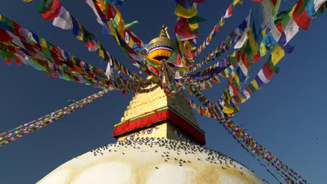 Boudhanath-Pagoda-in-Kathmandu,-Nepal.-Place-of-holy-worship-Boudhanath-Buddhist-Temple.-Steadicam-slow-motion-shot.-4K