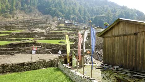 Colored-flags-in-Nepalese-village-Lho.-Manaslu-circuit-trek.