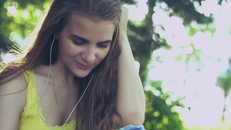 girl-with-headphones-in-the-Park