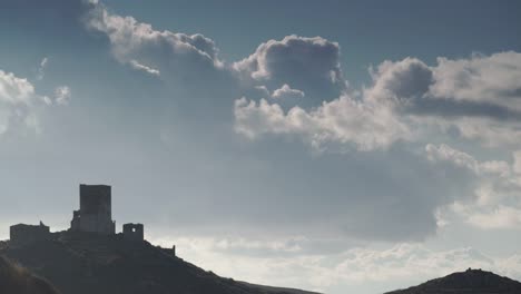 Stone-old-tower-house-on-Mani,-Greece.-Time-lapse